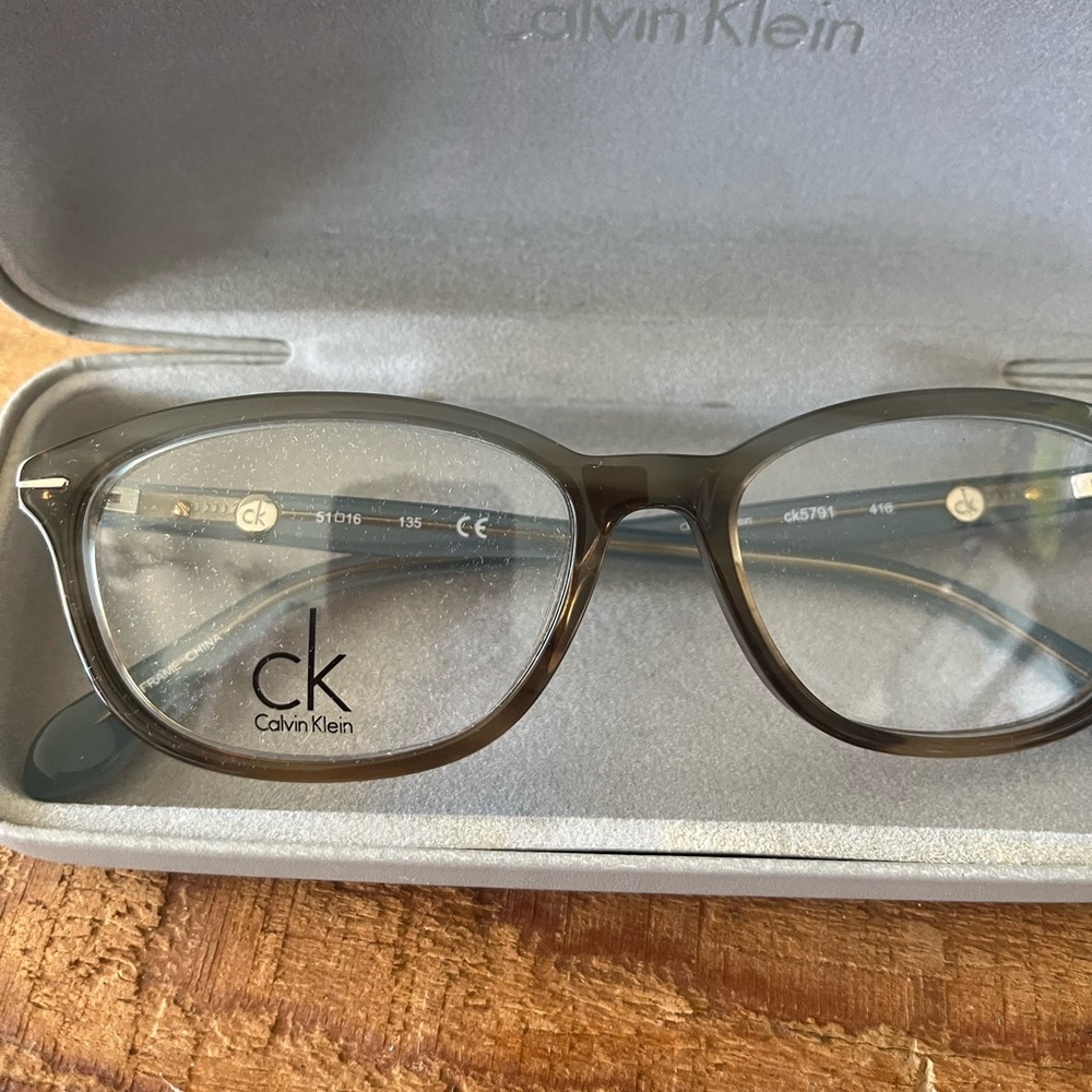Calvina Klein blue glasses